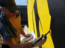 BVB Fassadenbild am U in Dortmund, @ work Wandmalerei, Wandbemalung, Wandgemälde, Wandbild, Fassadenmalerei, Fassaden, Bilder, Fassaden, Gestaltung, Street Art, Graffiti, BVB, Champions League 2013, Marco Reus, Borussia, PUMA, smart art, Airbrusher Martin Dippel, Dortmund